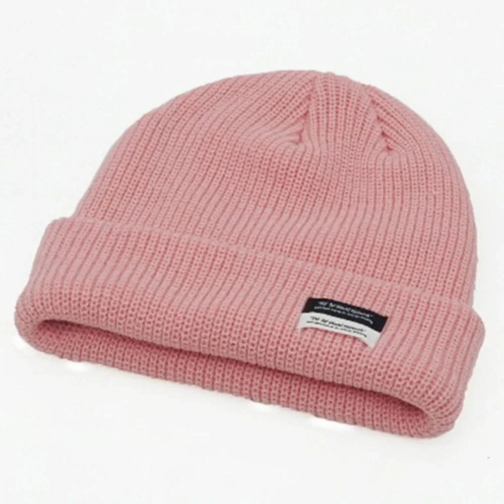 Tuque en tricot rose